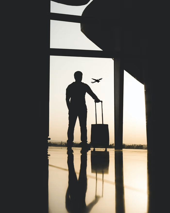 man standing in a airport